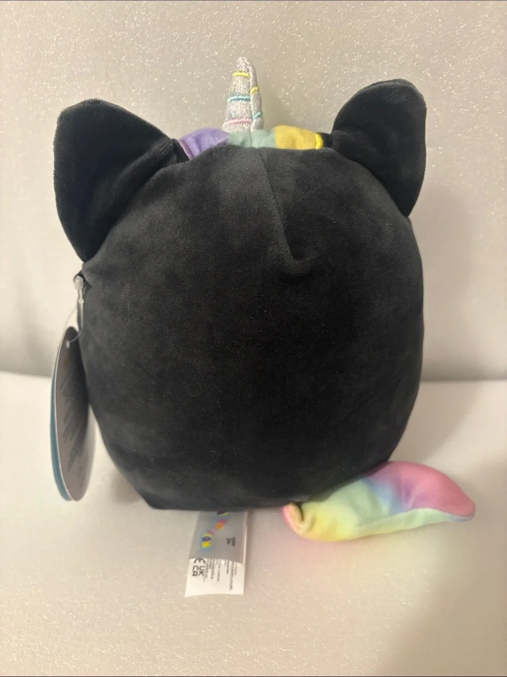 Squishmallows Black Unicorn Cat Plush with Rainbow Accents